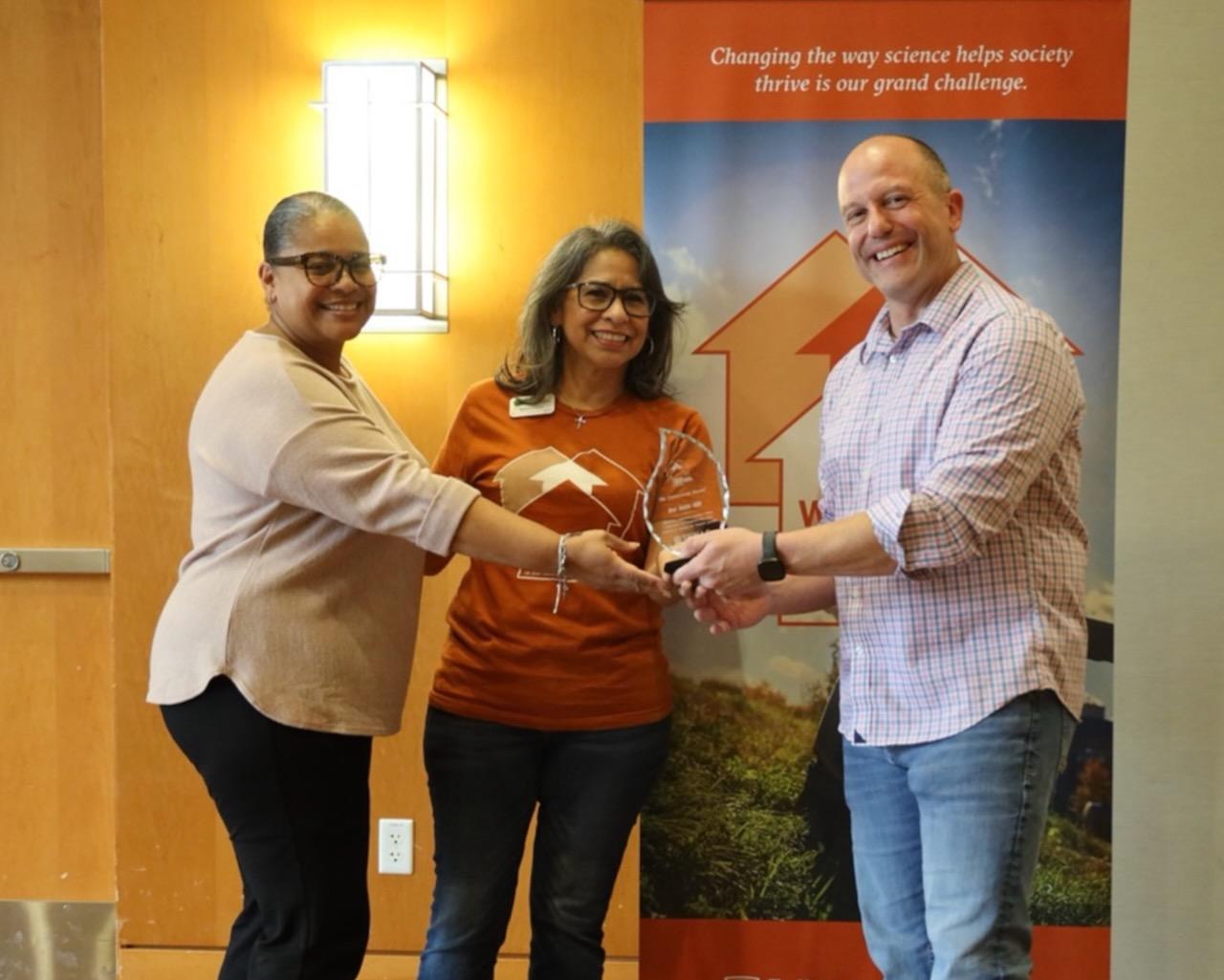 Araceli McBeth and Rebecca Gomez accept the Guiding Light Award