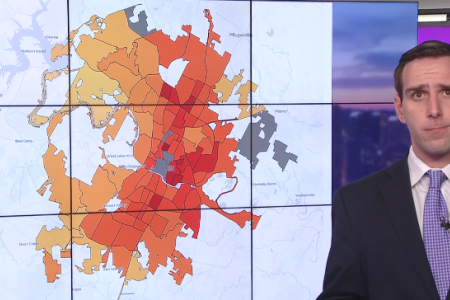 Screen grab of KVUE's (ABC) Daniel Perreault reporting on this story. He stands next to a map that shows the current risk of death to Austin's elderly population if they were to stay inside their home during a heatwave and coincidental power outage. The median heat risk for each neighborhood is displayed as the value.